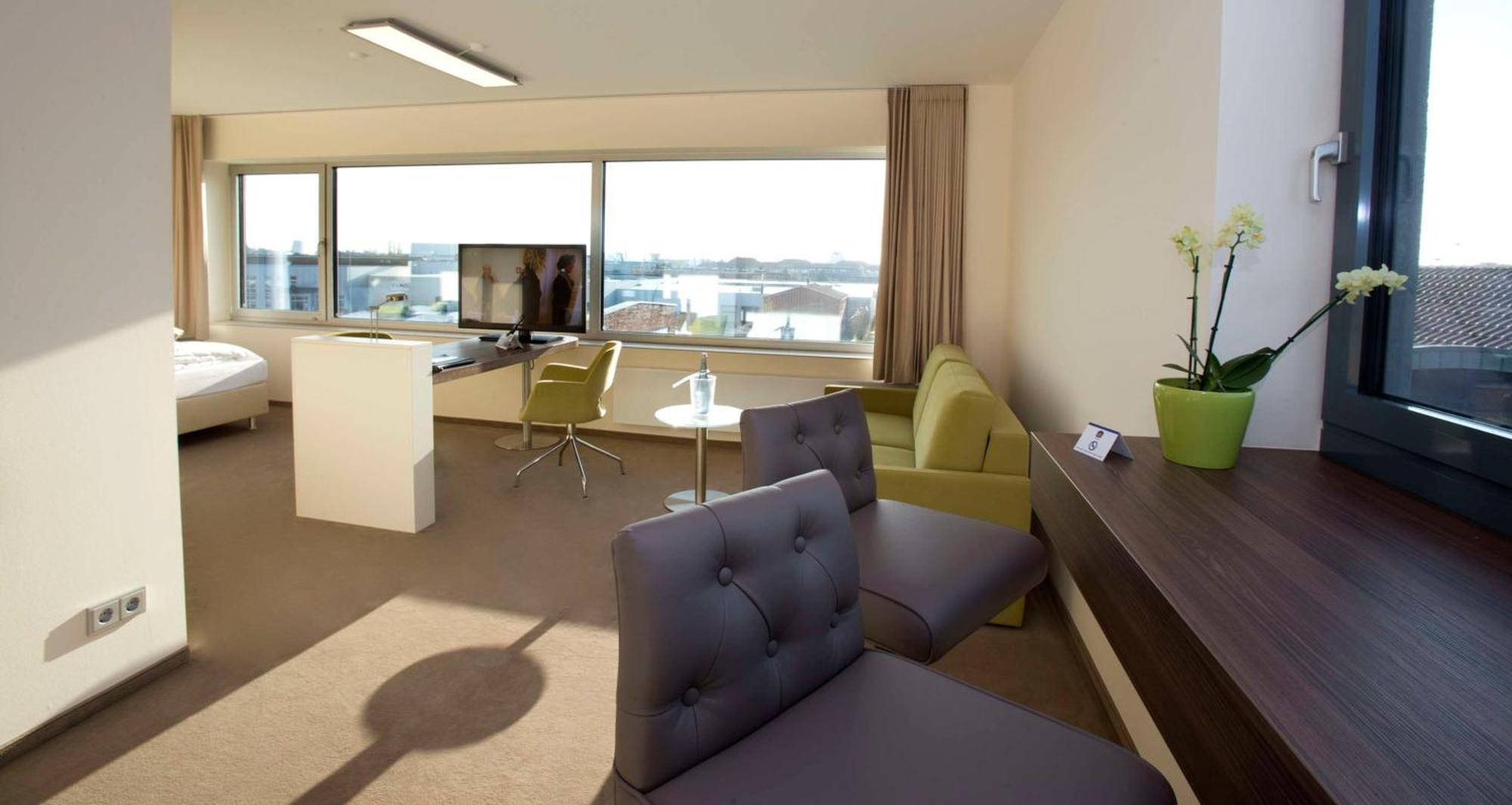 Suite with Two Single Beds and Sofa Bed