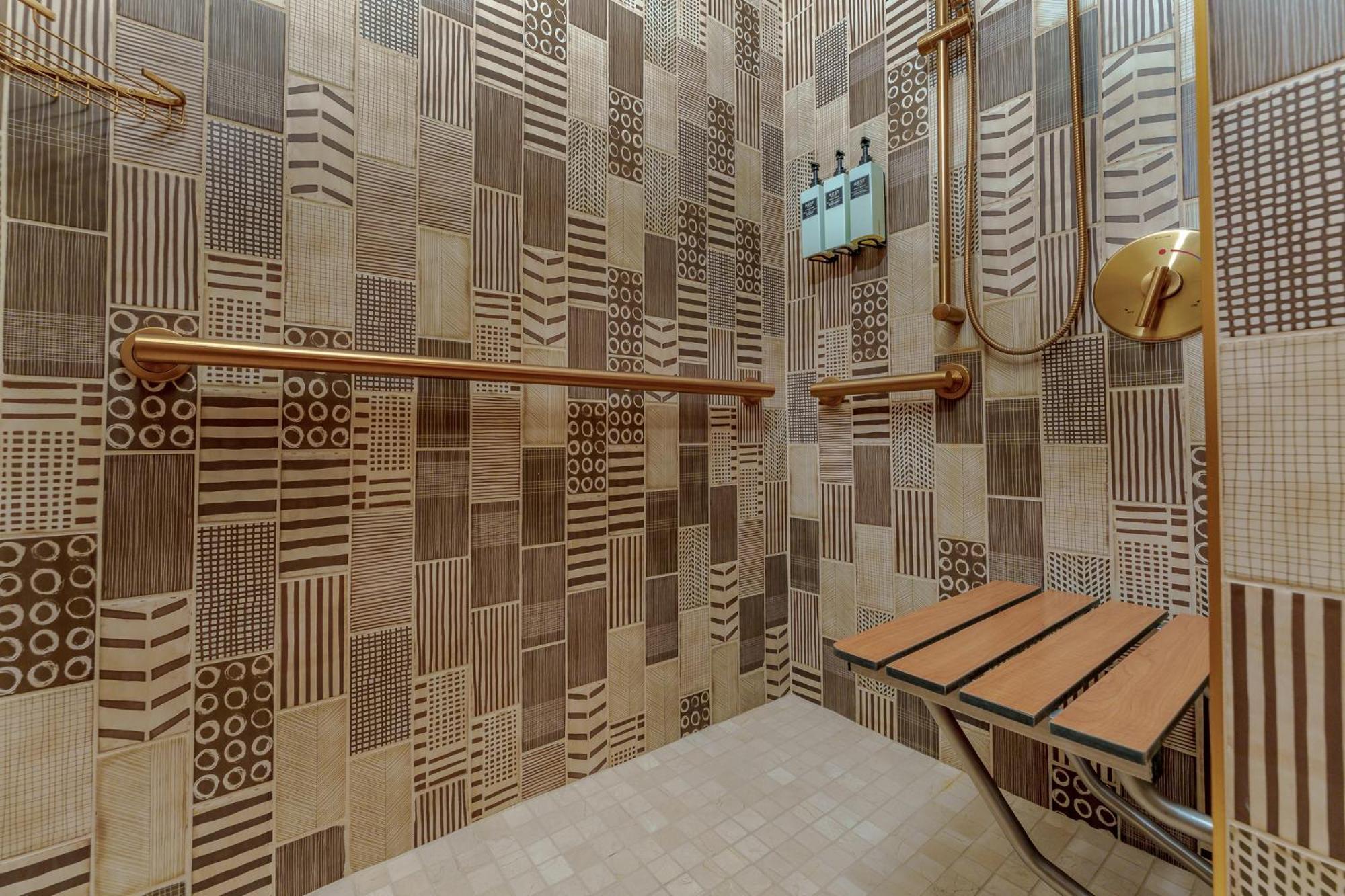 1 King Suite with Accessible Roll-in Shower