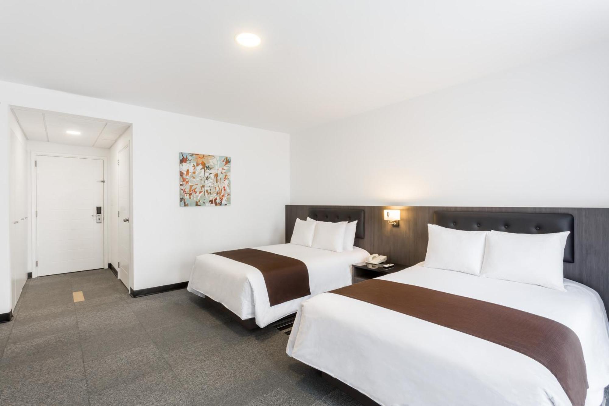 Double Room Two Double Beds Roll Shower Mobility Access or Non-Smoking
