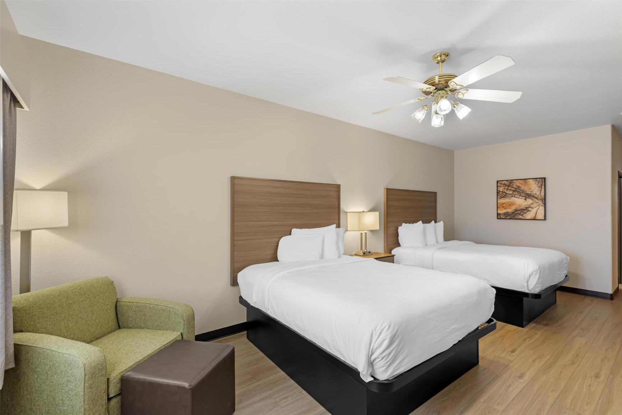 One-Bedroom Queen Suite Two Queen Beds Living Area Walk Shower Non-Smoking