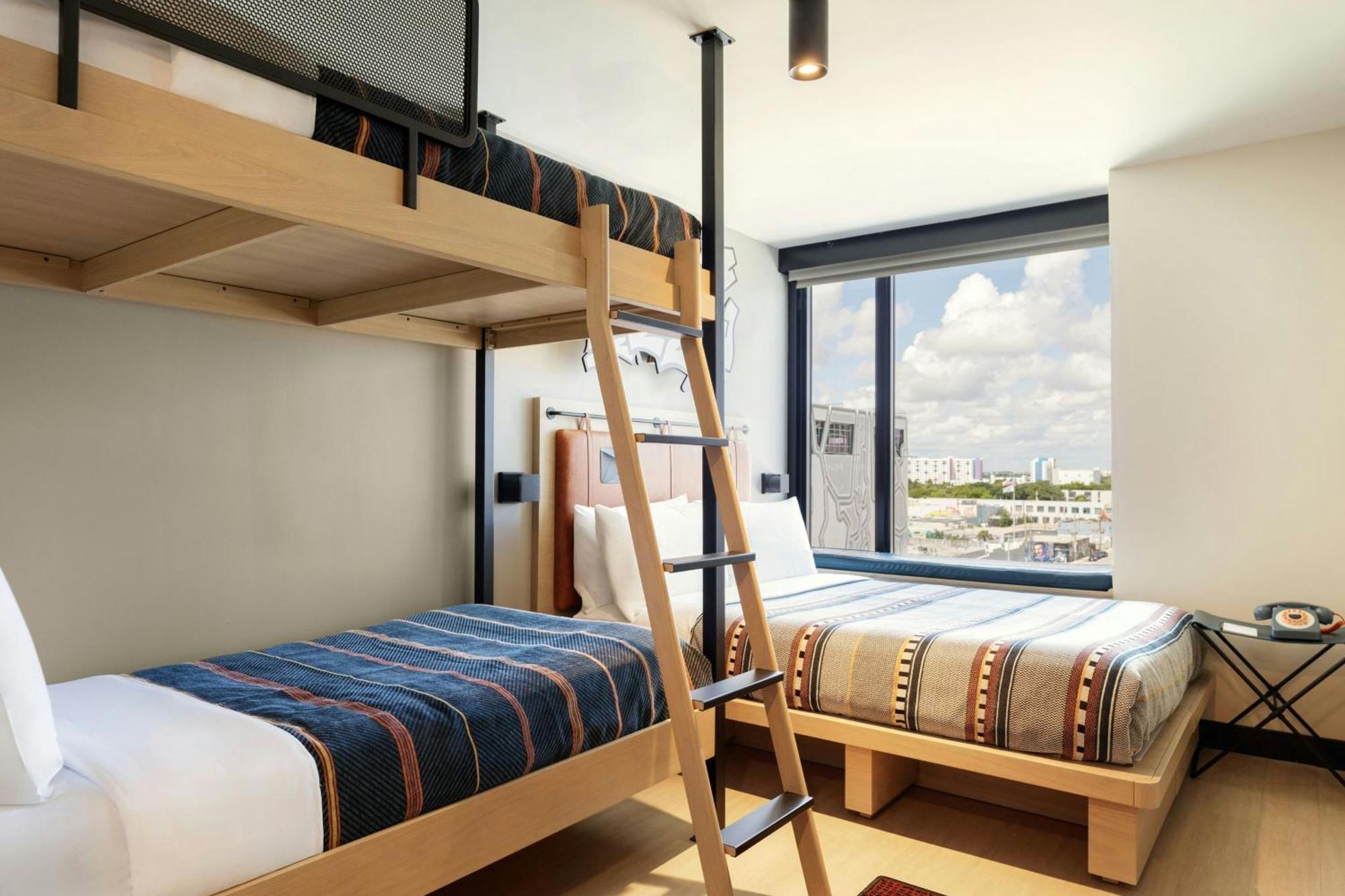 Room One Queen Bed One Set of Bunk Beds