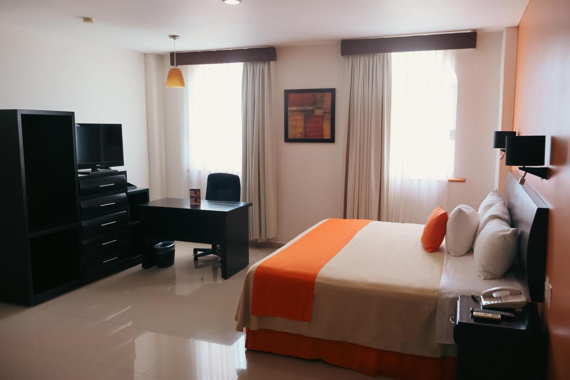 Habitación con cama extragrande.
