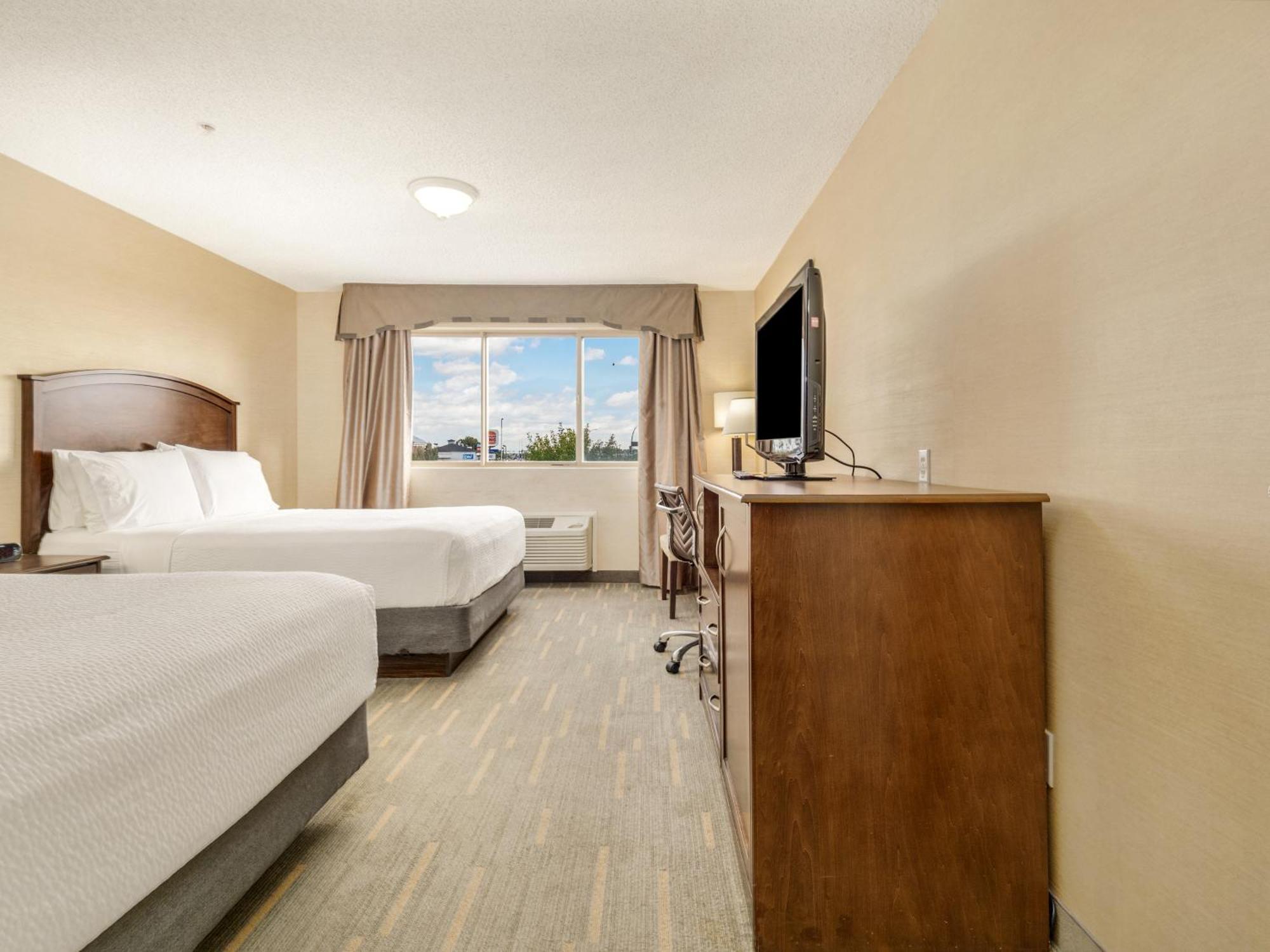 One-Bedroom Executive Board Room Two Queen Beds