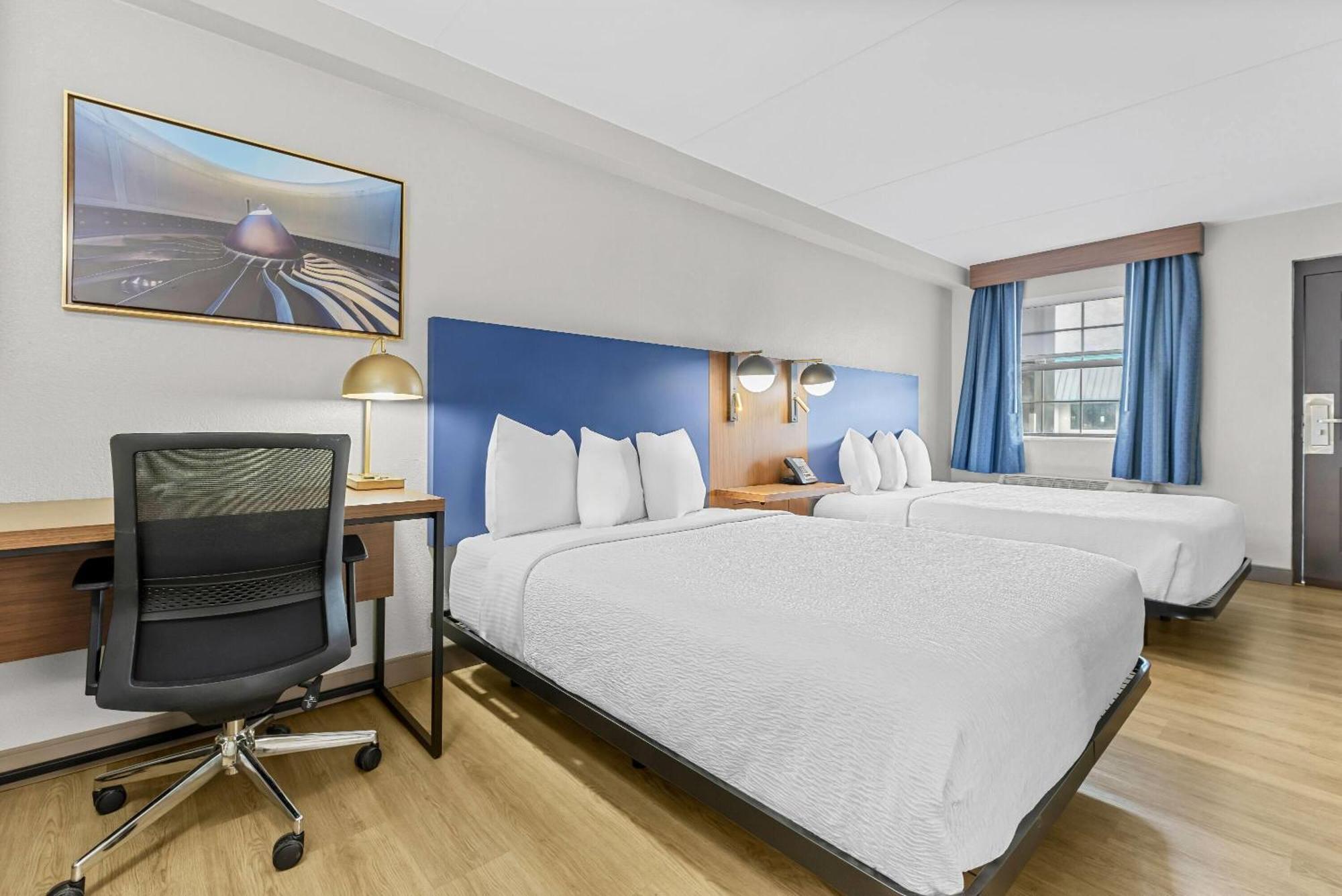 Queen Room Two Queen Beds Roll Shower Mobility Accessible or Non-Smoking