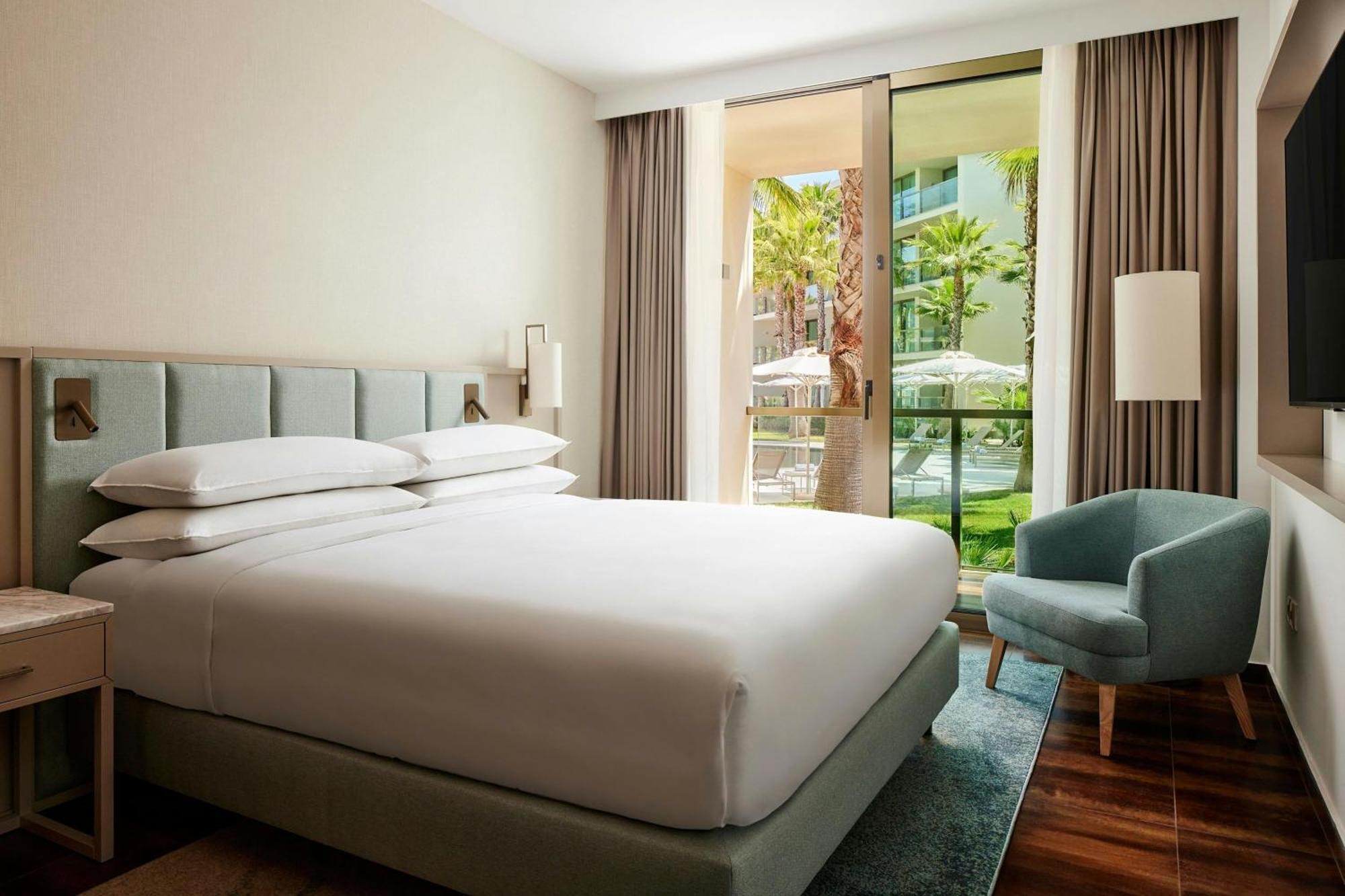 Two-Bedroom Suite Balcony Pool View