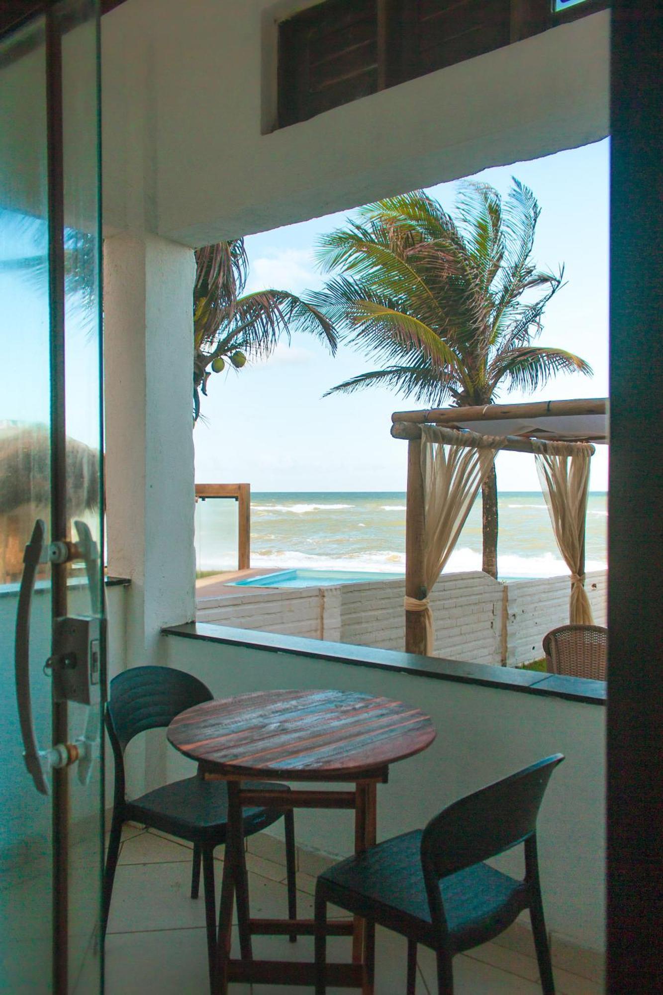 Quarto Quádruplo com Vista do Mar.