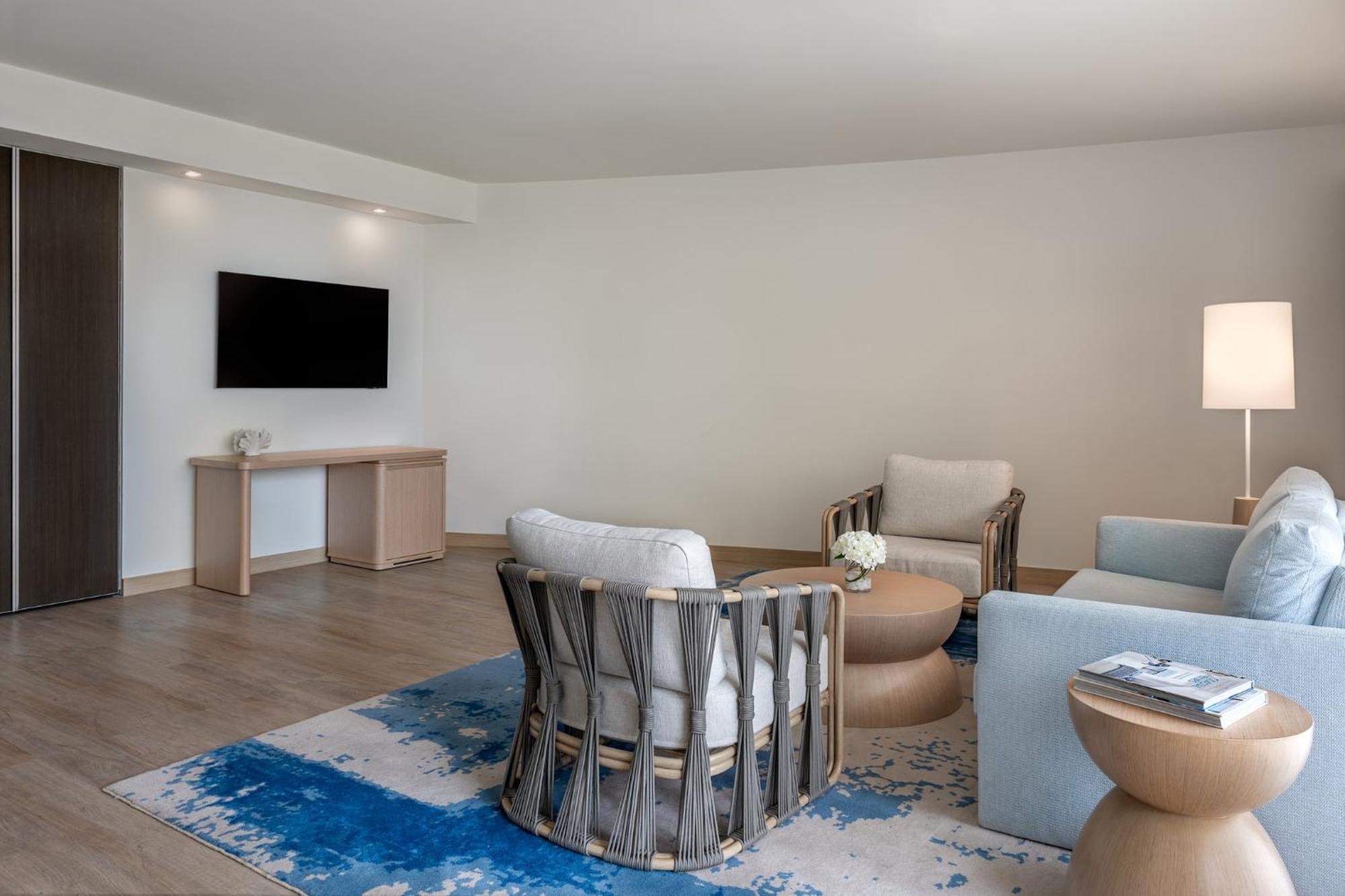 One-Bedroom Suite Plaza View Living Area Theme Park Access
