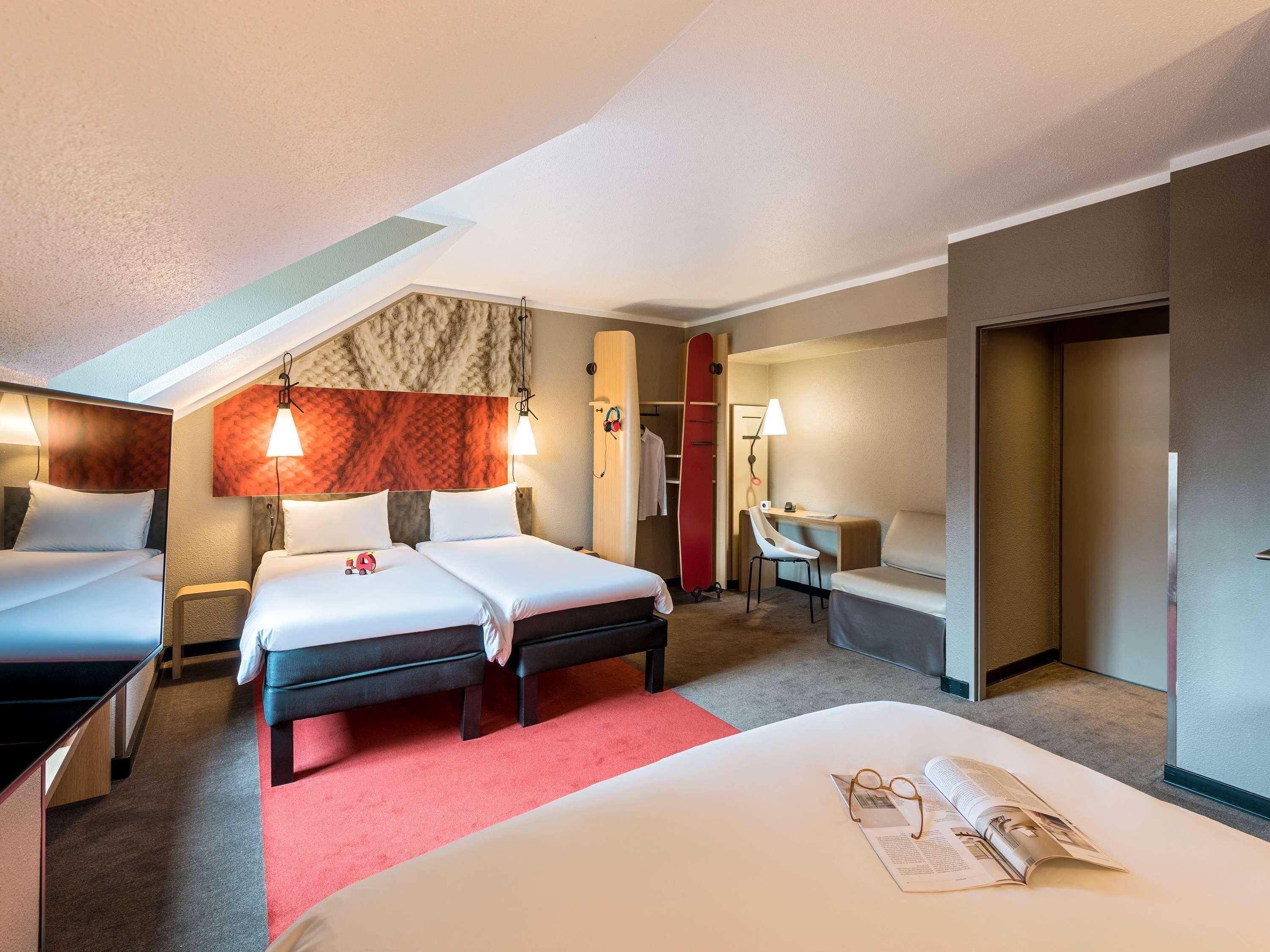Room with a Double Bed and One Single Bed