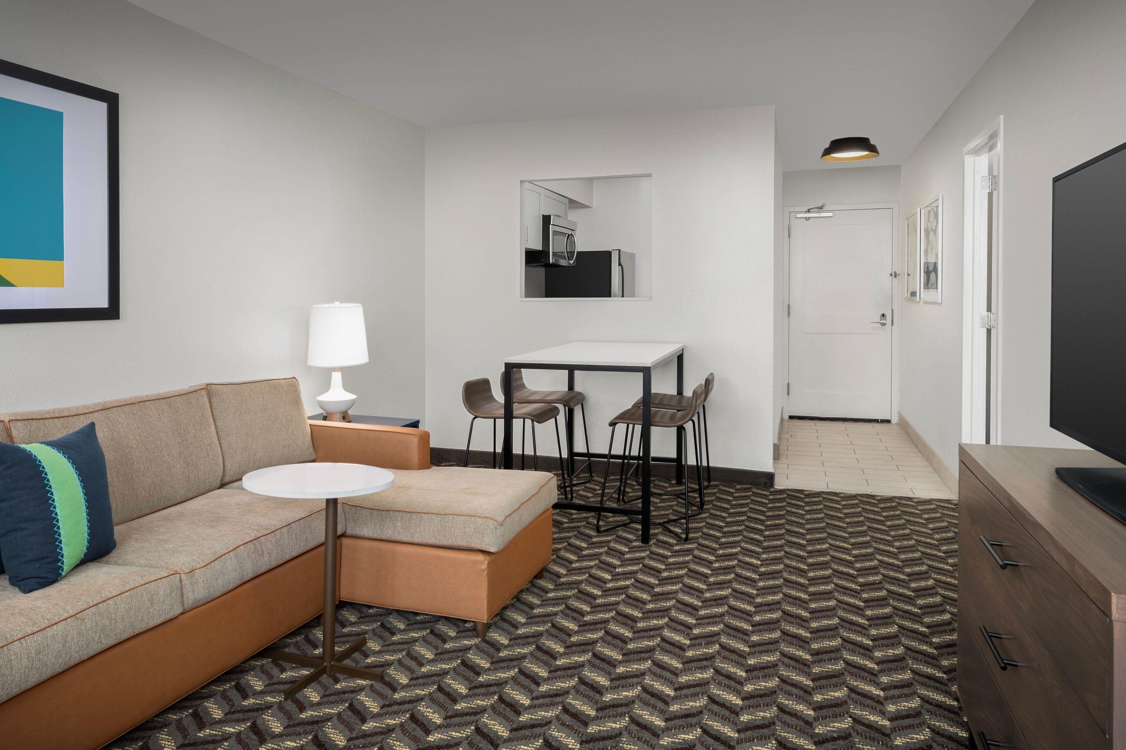 One-Bedroom Queen Suite Sofa Bed Mobility or Hearing Accessible Roll Shower