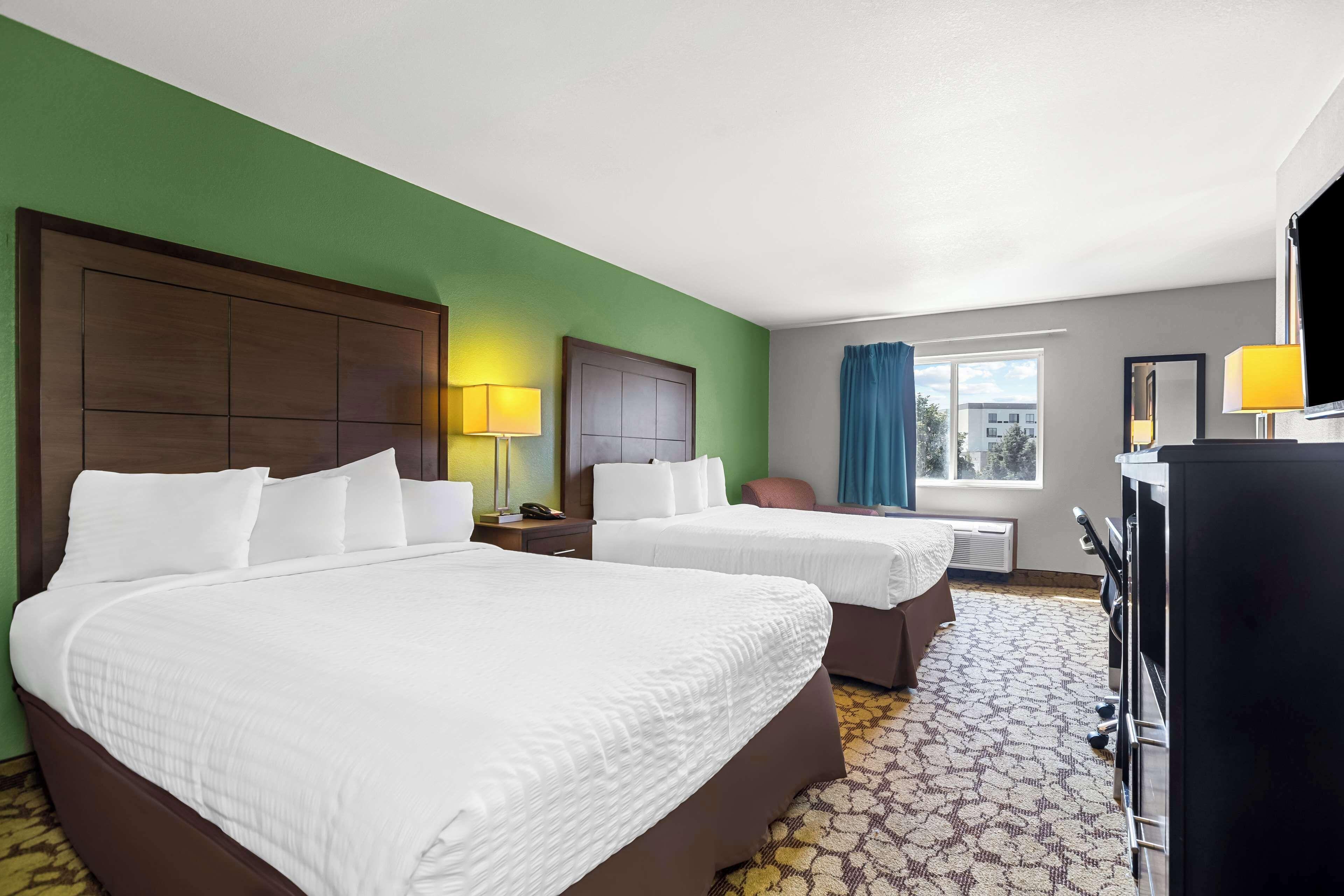 Family Room Two Queen One Double Beds