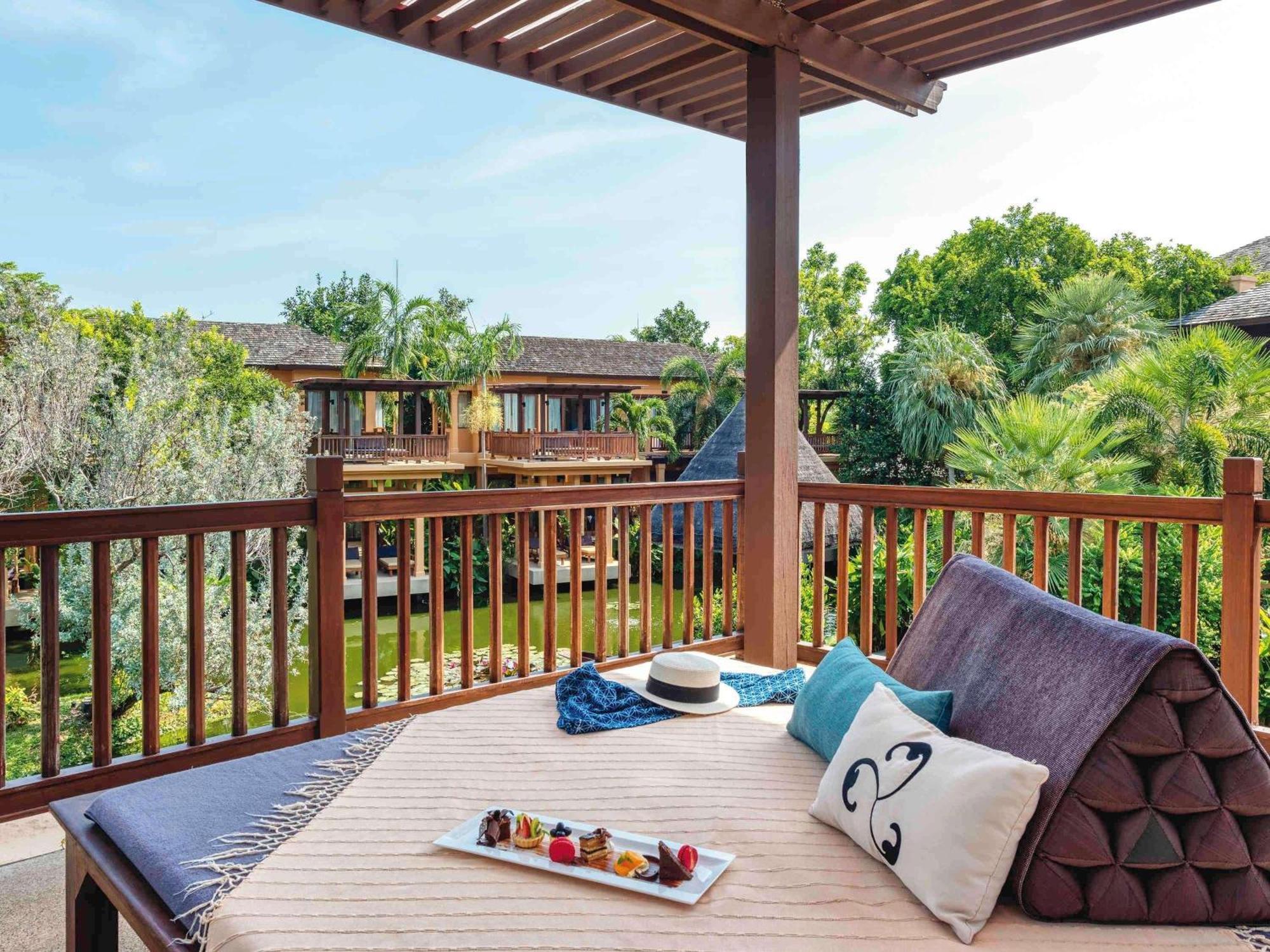 Suite mit Kingsize-Bett, Terrasse und Lagunenblick