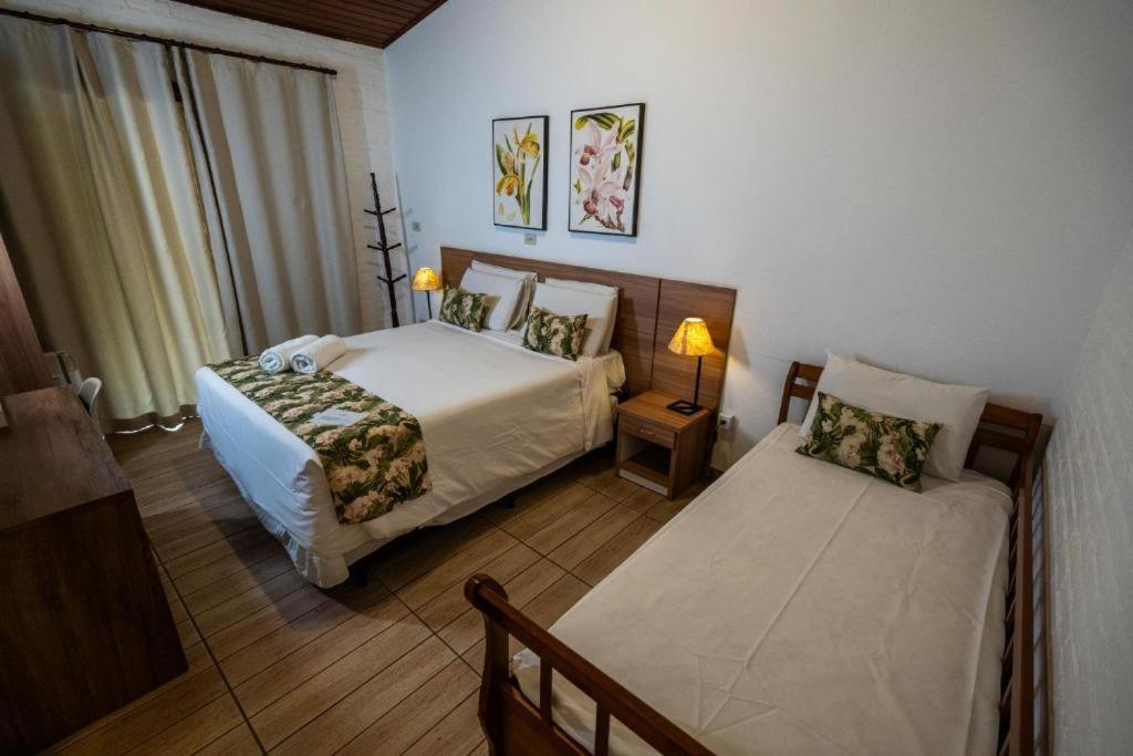 Quarto Quádruplo com Vista da Montanha