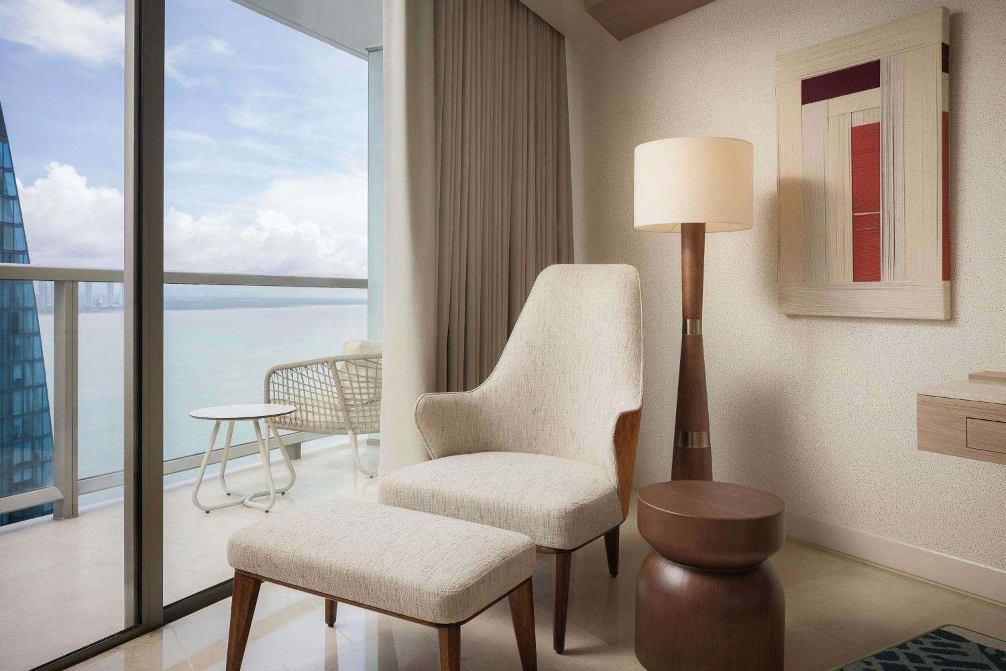 King Guest Room Balcony Partial Ocean View