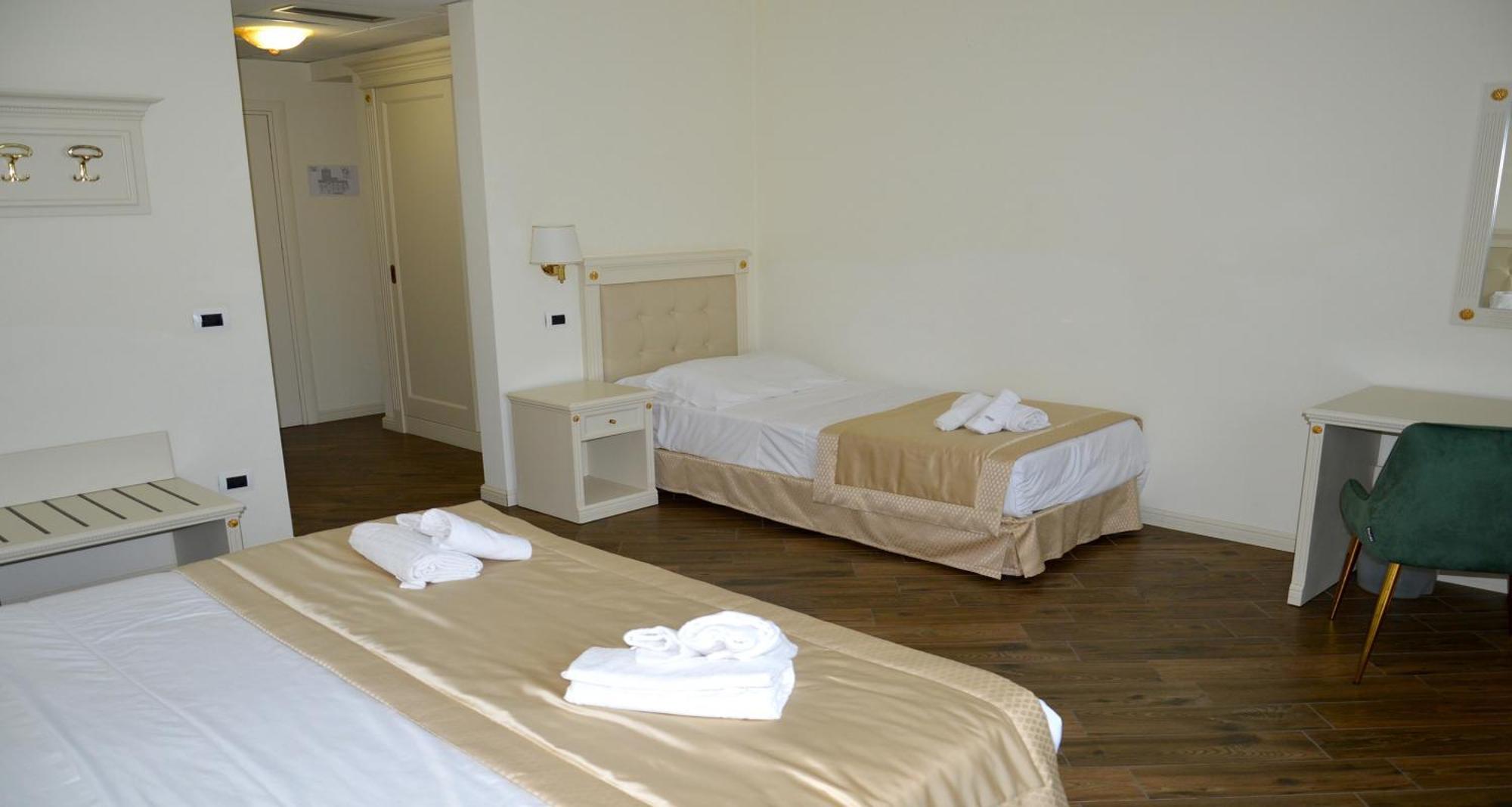 Camera Queen Comfort con Letto Singolo Supplementare