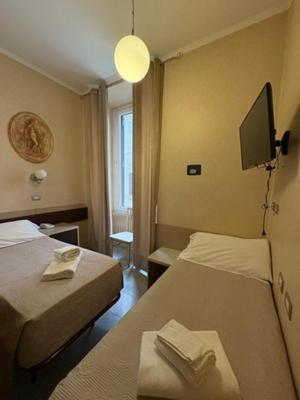 Camera Doppia con Letti Singoli