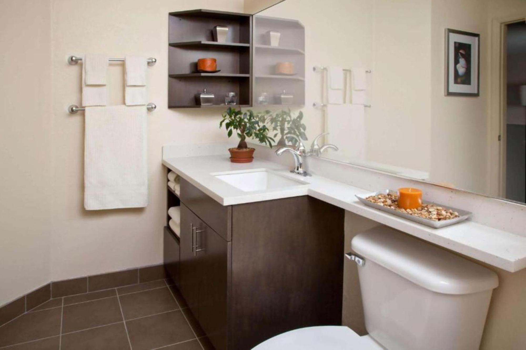One-Bedroom Queen Suite Communications Mobility Accessible Roll Shower