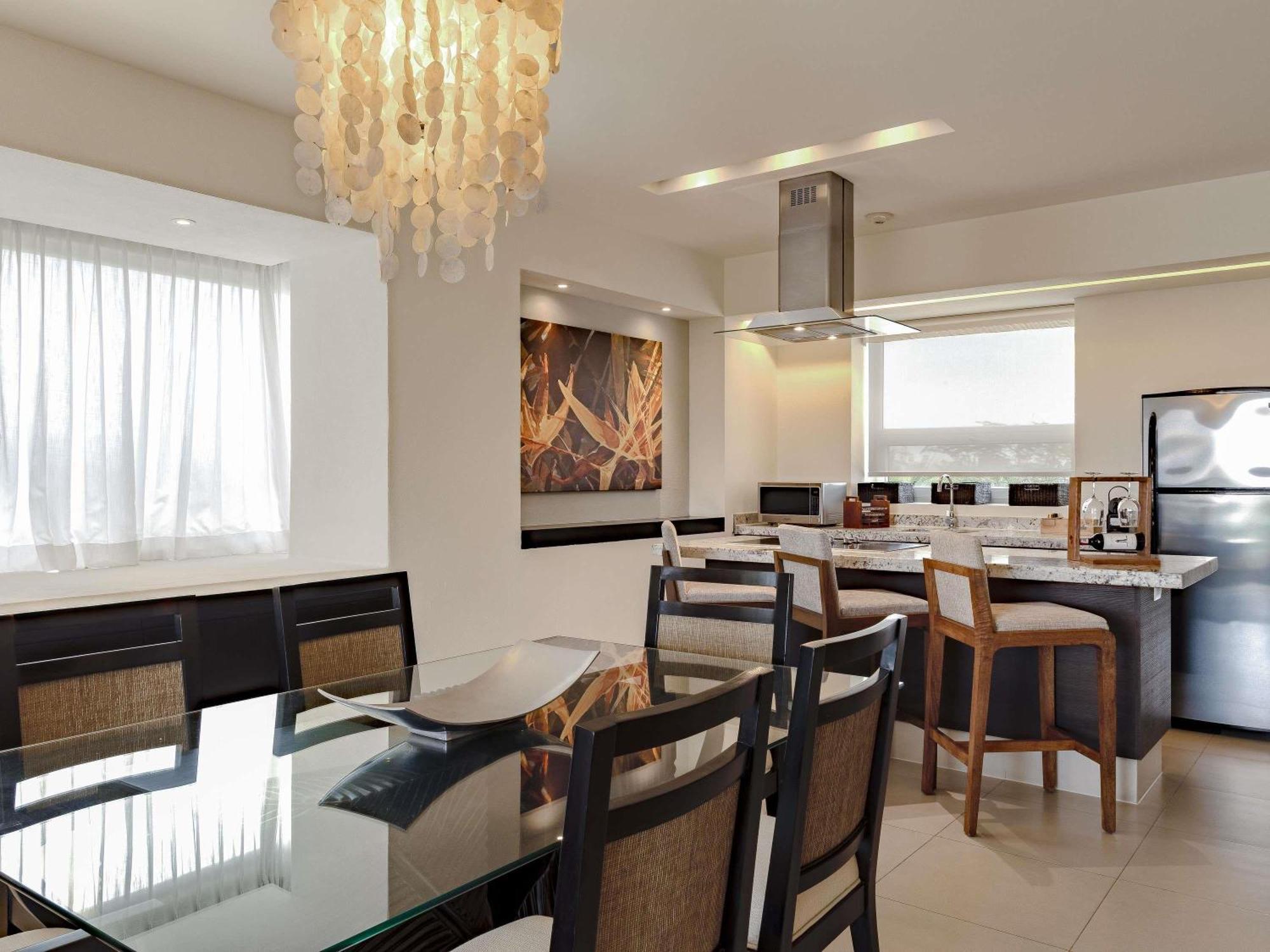 One-Bedroom King Room Balcony or Terrace Kitchen