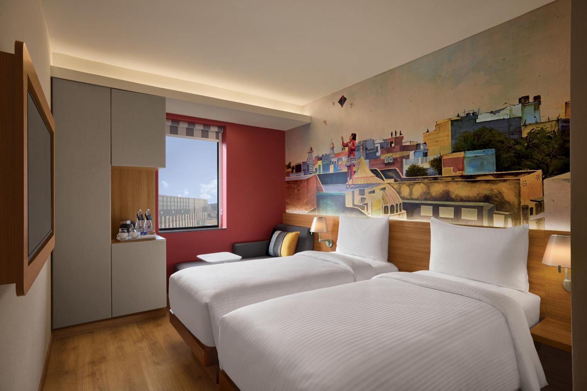Deluxe Twin Room One-Way Complimentary Airport Transfer on F&B