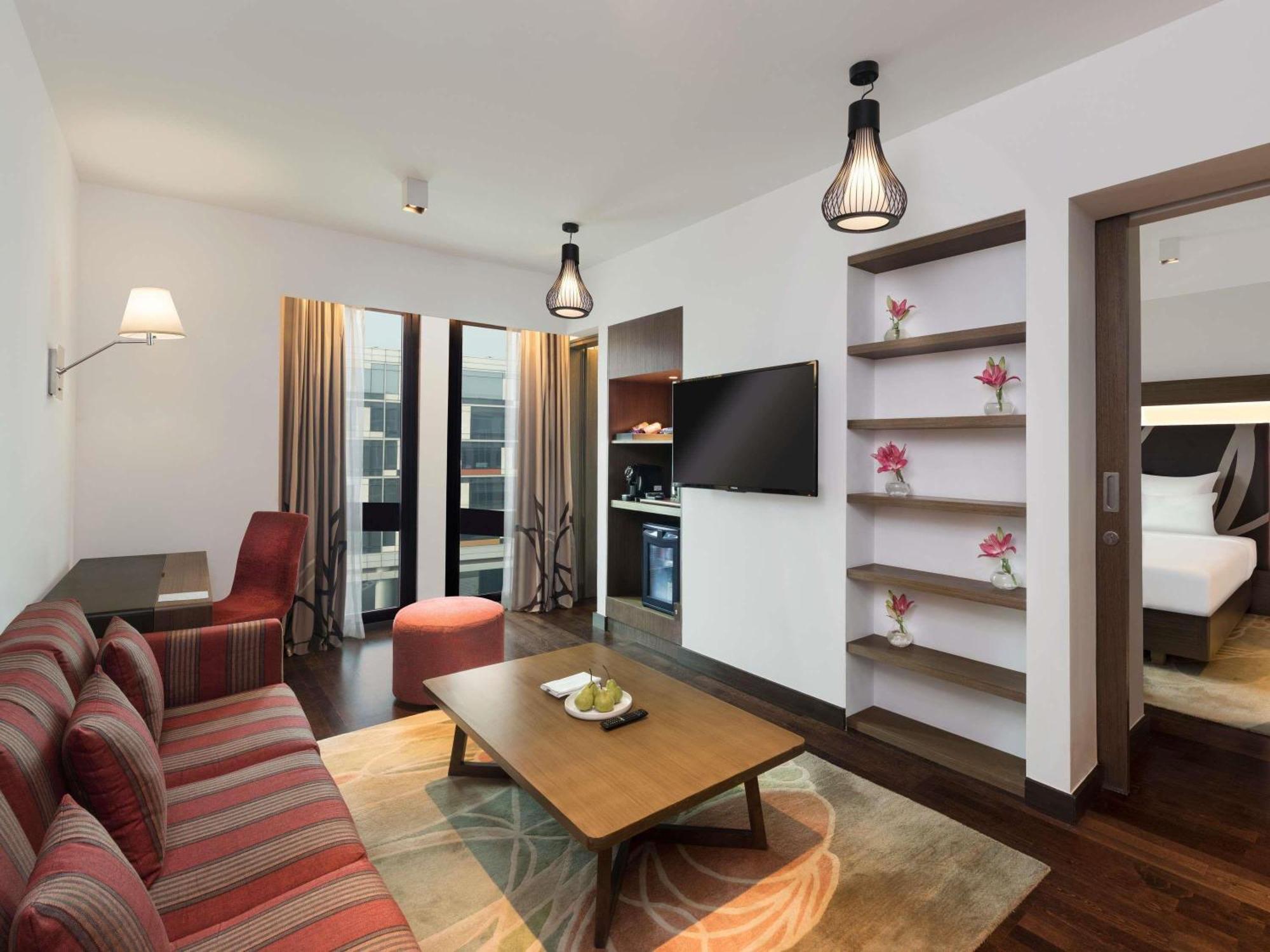 Junior Suite 2 Way Airport Transfers Lounge Access on F&B Laundry