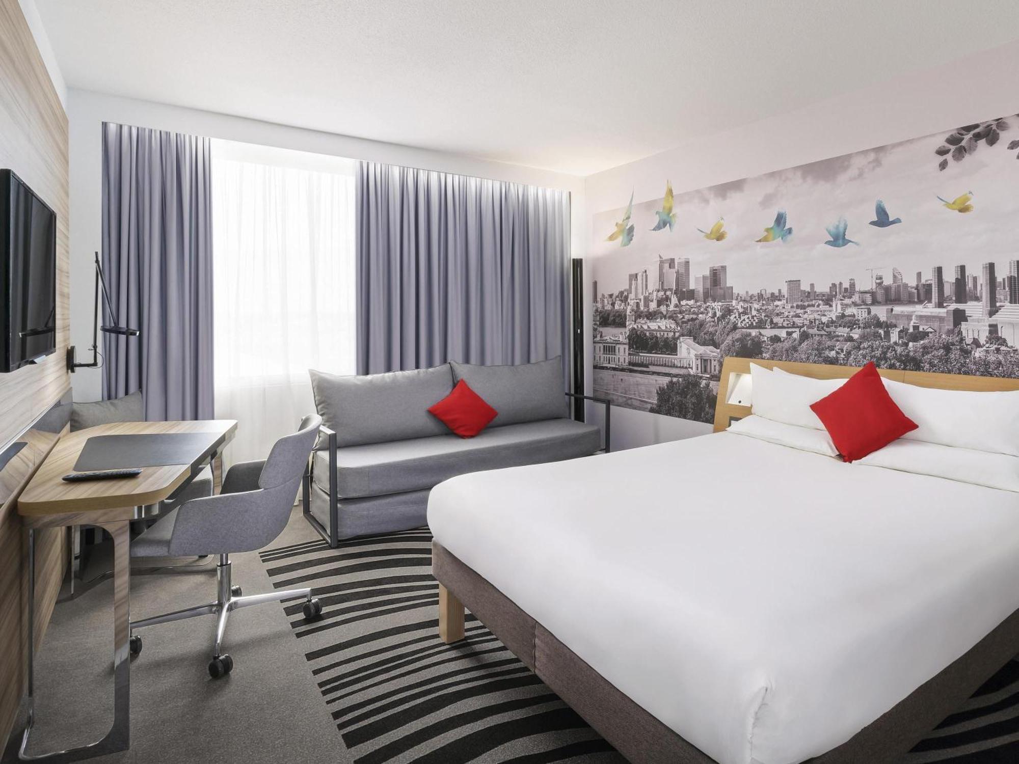 Superior Kamer met 1 Queensize Bed + Slaapbank