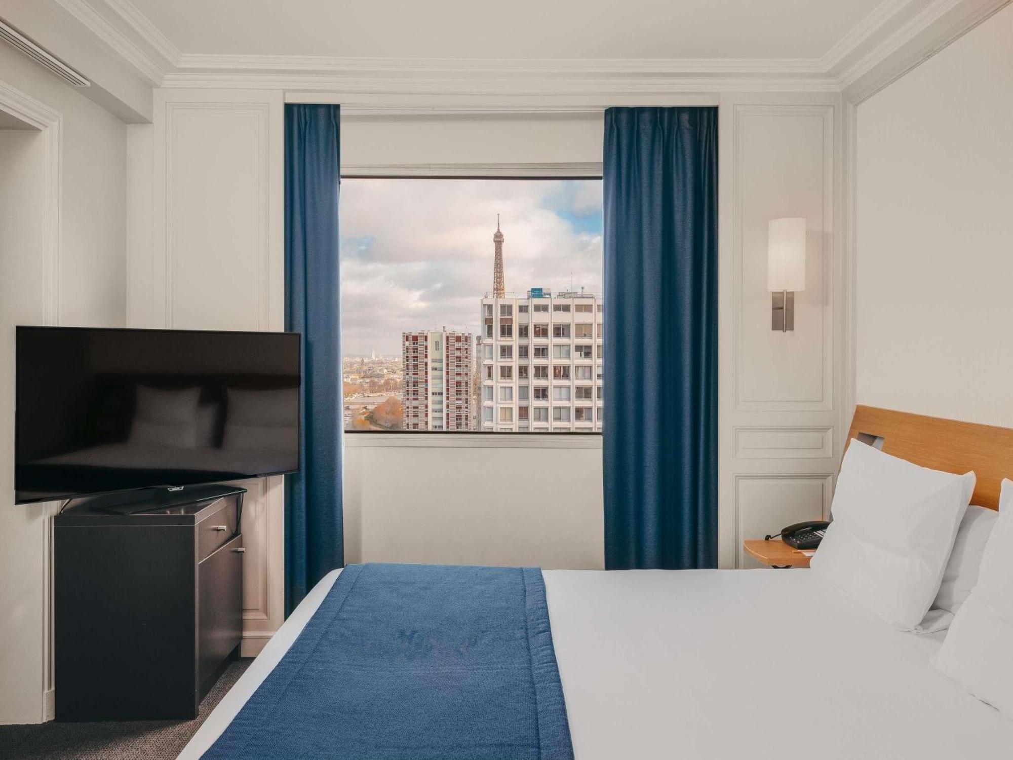 Junior Suite met 1 Queensize Bed en Bank