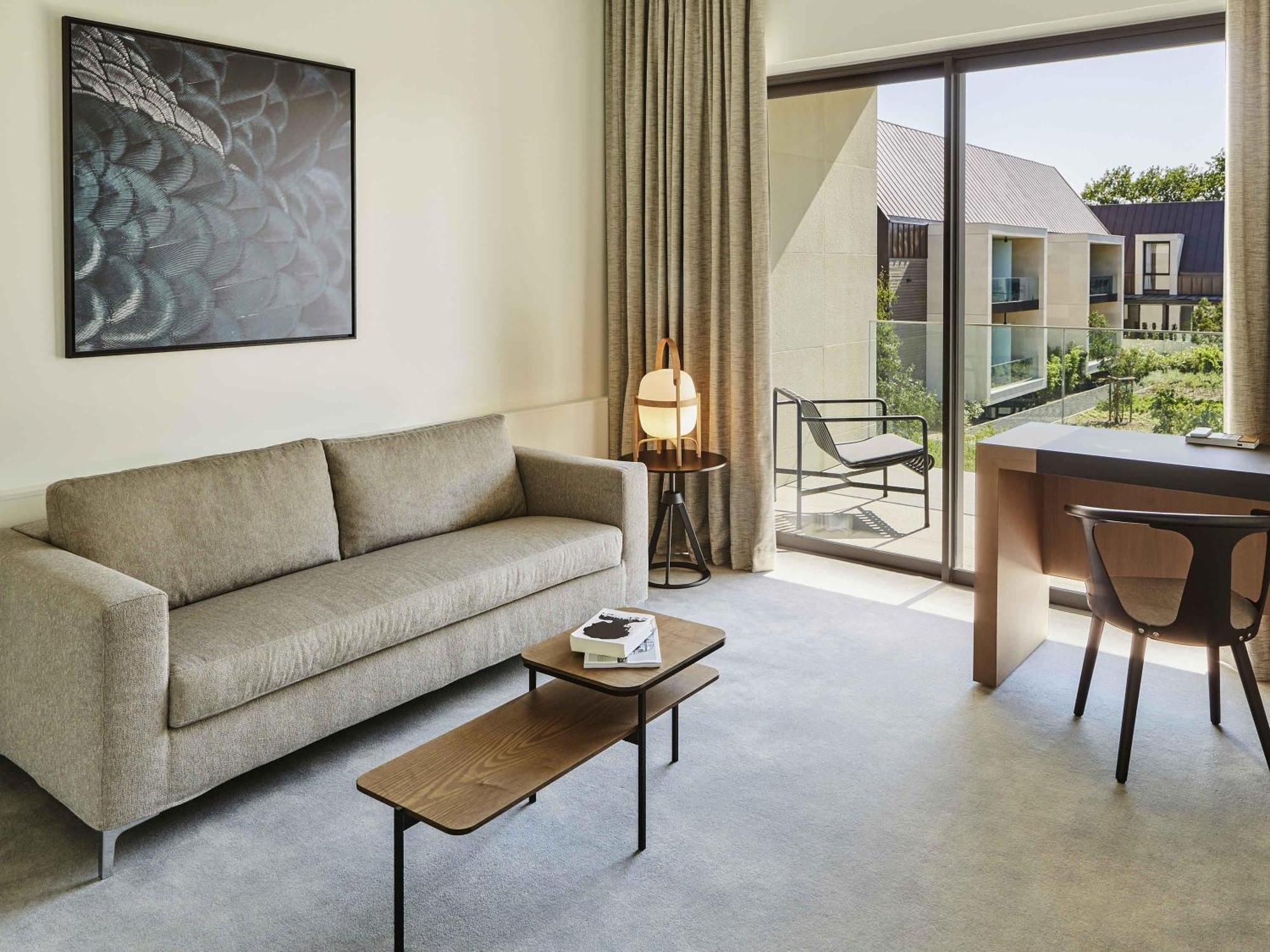 Deluxe King Suite Sofa Bed Patio View Terrace