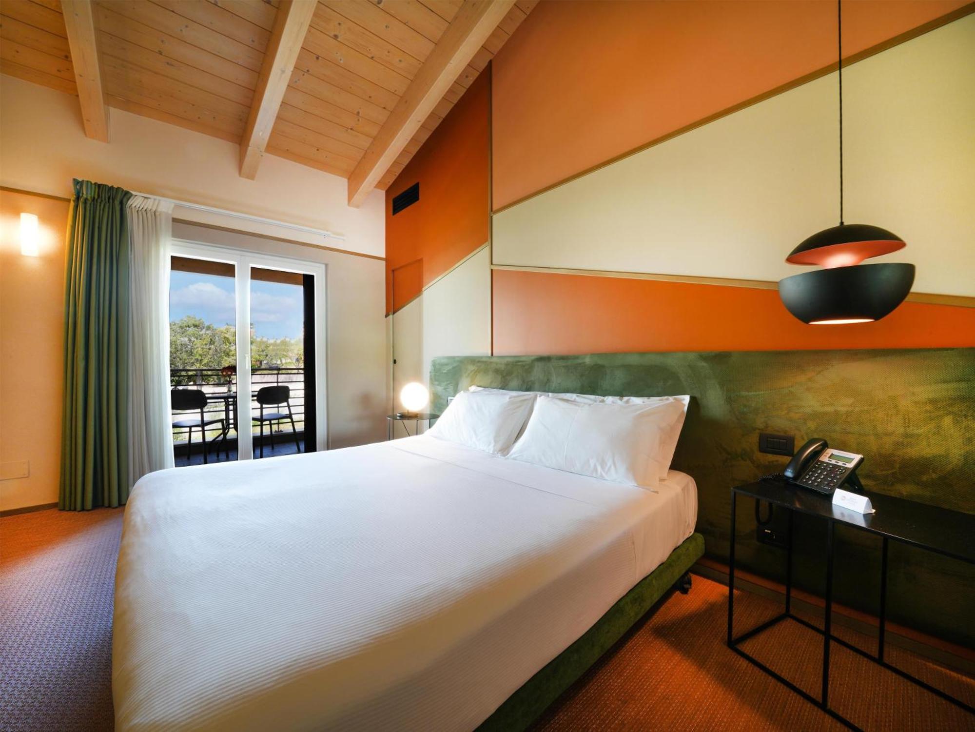 Superior Room One Queen One Single Bed Balcony Non-Smoking