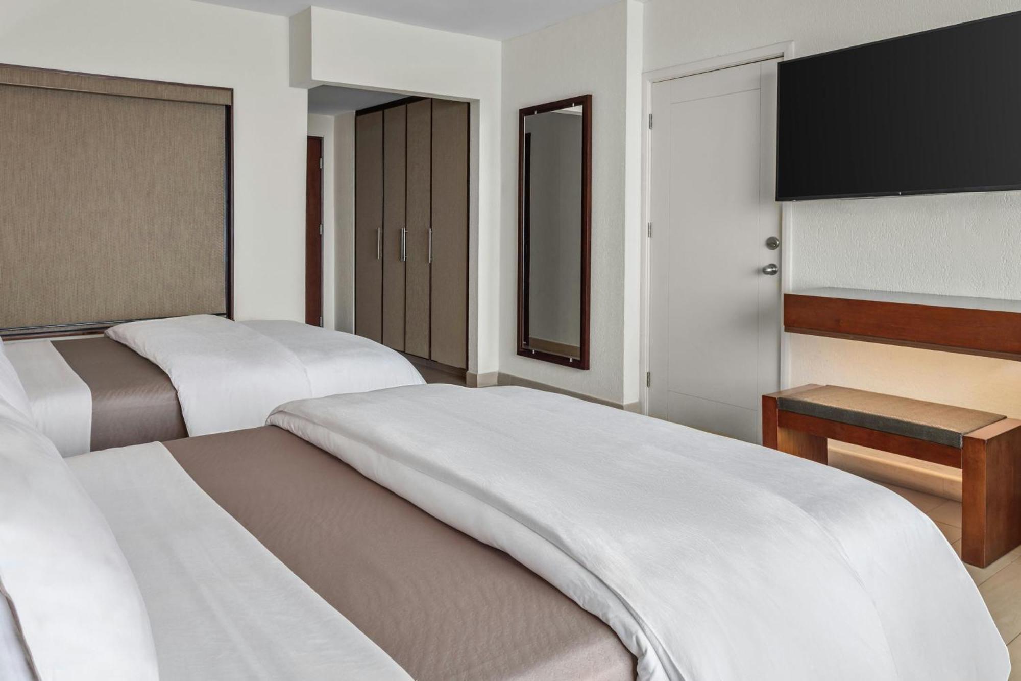 Premium Queen Room Two Queen Beds Tropical View High Floor