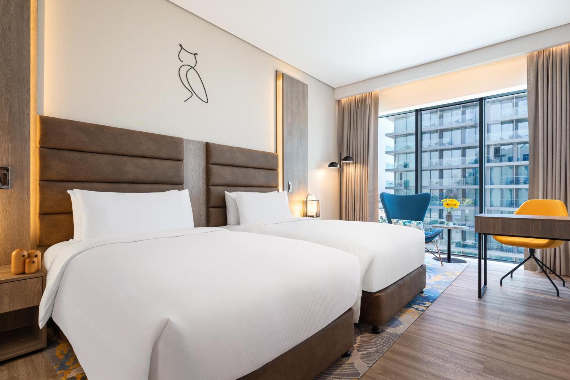 Deluxe Tweepersoonskamer met 2 Aparte Bedden en Zijdelings Uitzicht op Zee/Palm Jumeirah
