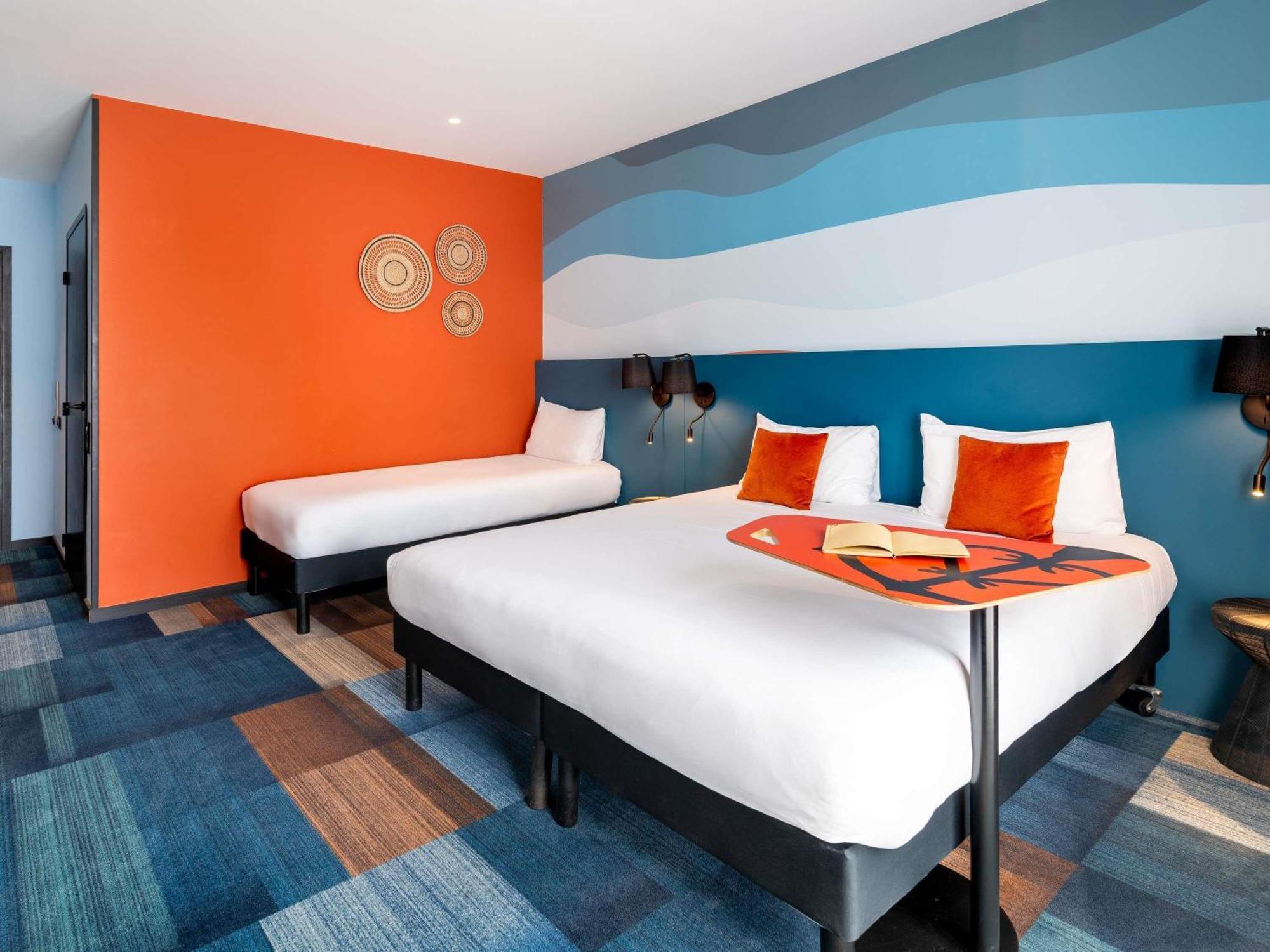 Premium Family Room Three Single Beds or One Double Bed One Single Bed