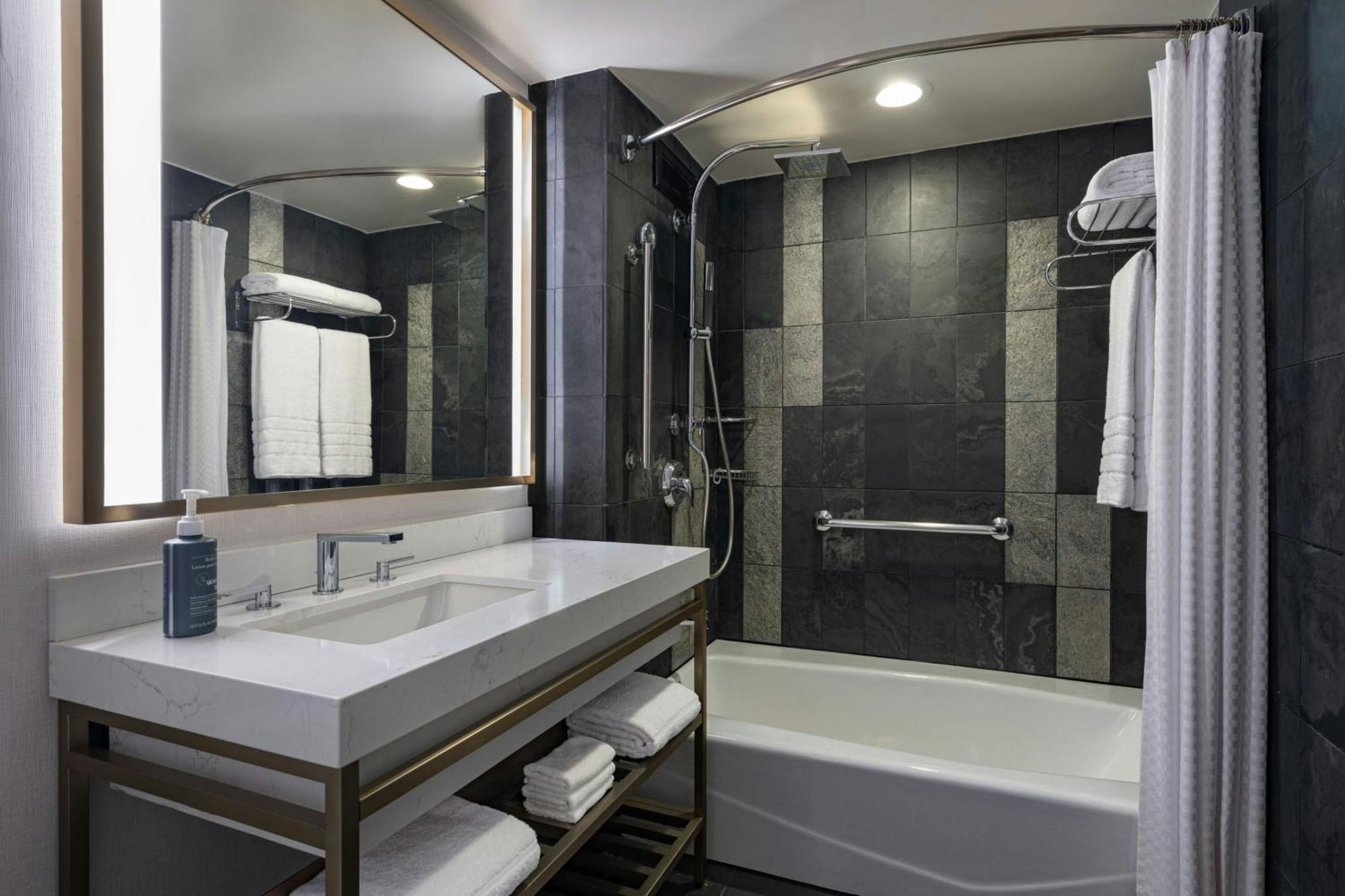 Grand Deluxe Queen Room Two Queen Beds Roll Shower Mobility Hearing Accessible