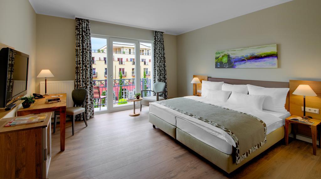 Deluxe Doppelzimmer mit Balkon zum Garten