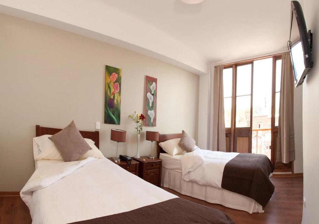 Quarto Superior com Cama de Casal ou 2 de Solteiro