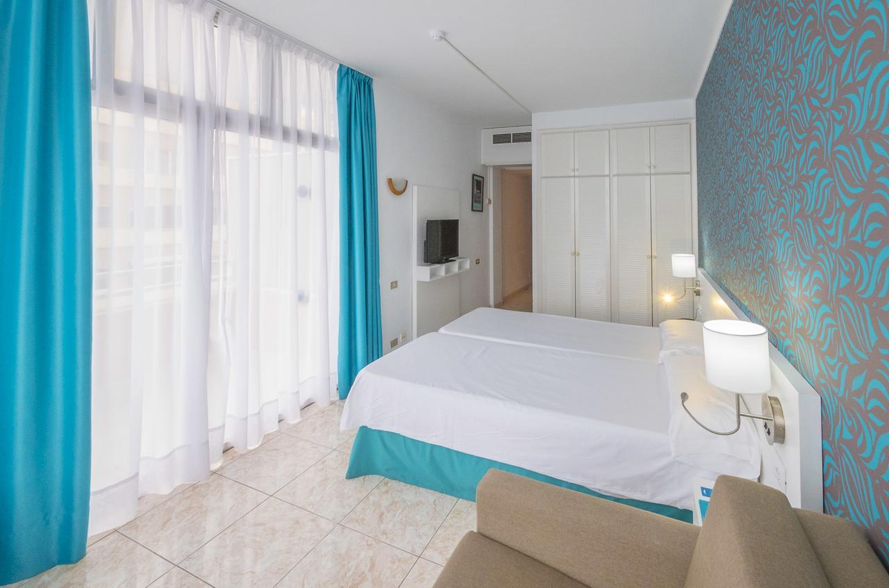 Chambre Triple Premium (2 Adultes + 1 Enfant)
