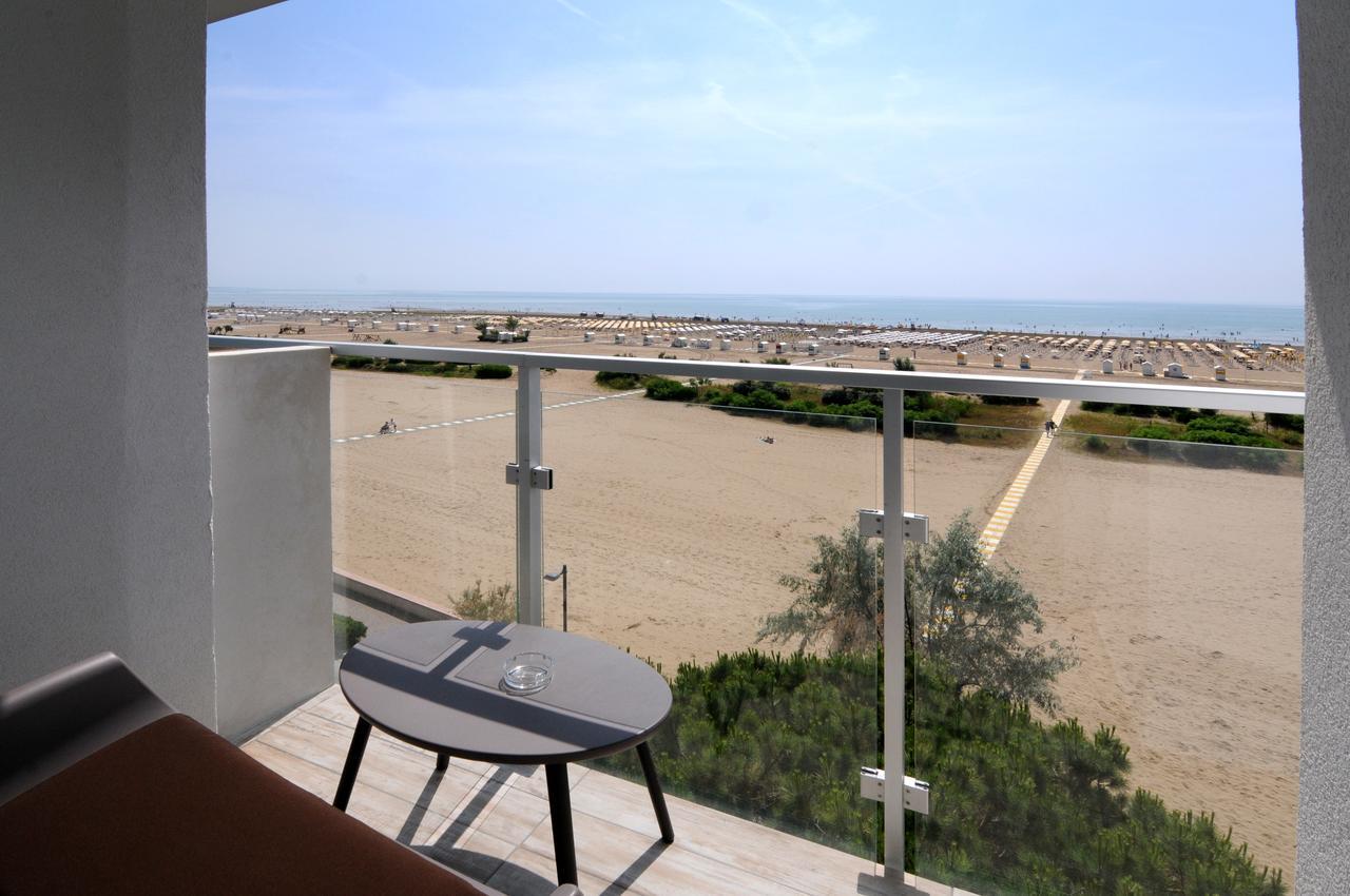 Camera Tripla Deluxe con Balcone e Vista Mare