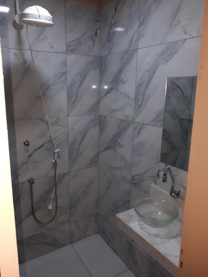 Cama de Solteiro em Dormitório Misto com Ar-Condicionado