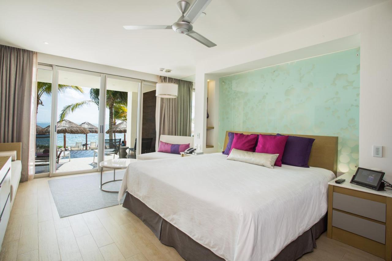 Xhale Club Junior Suite mit Kingsize-Bett und direktem Poolzugang - Meerseite