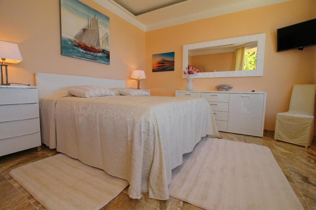 Two-Bedroom Royal Suite with Balcony and Sea View