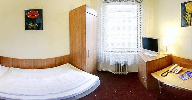 Dreibettzimmer