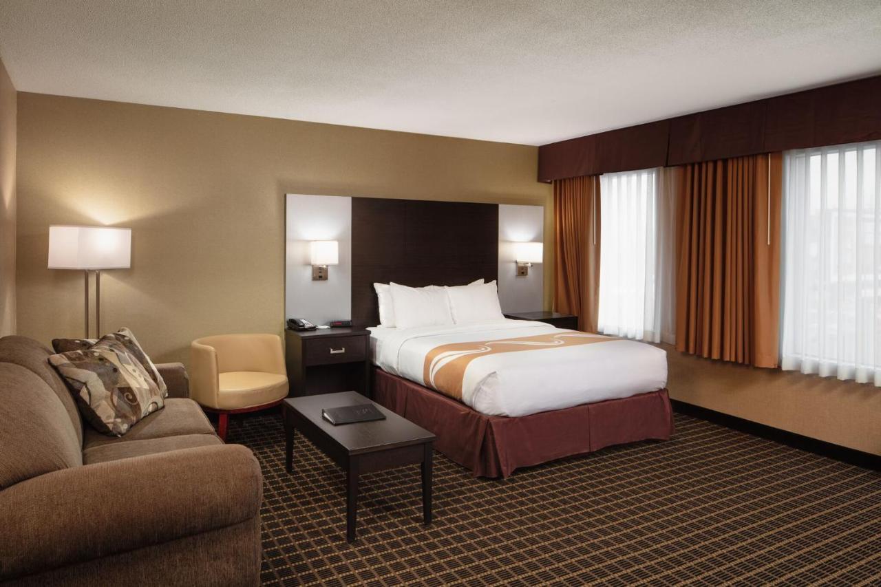 Deluxe King Suite with a joining living room & sofa bed