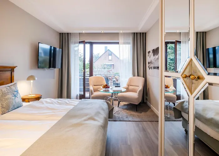 Büngers Apartment-Hotel mit Gartensauna - modern, gemütlich und strandnah
