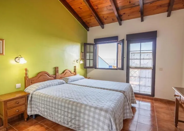 Complejo rural Alhelí - Apartamentos y habitaciones Valdredo