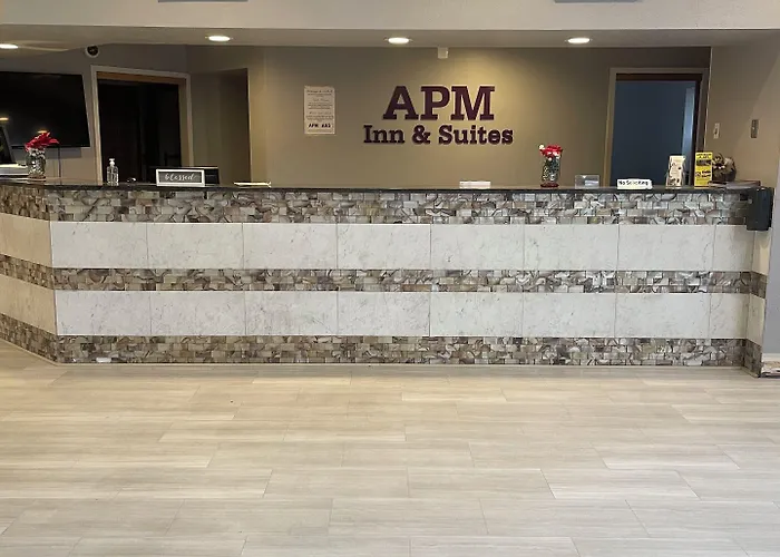 Apm Inn & Suites