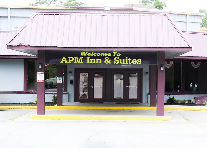 Apm Inn & Suites